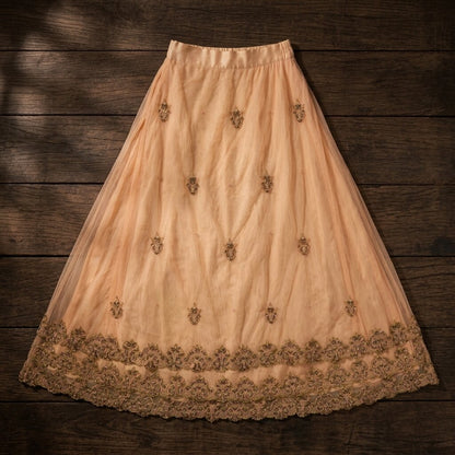 Sanskriti Vintage Beige Net Stitched Premium Lehenga For Women Hand Beaded Zari